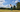 Golfer swings her golf club