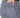 Close-up of a person wearing navy and white geometric patterned golf pants, with a hand in the back pocket.