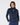 Navy women’s quarter-zip golf pullover with subtle star print, layered over a blue mock-neck top.