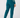 Teal women’s golf jogger pants with high-rise waistband and cuffed ankles, modeled from the back.