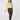 A woman modeling a light lime green long-sleeve mock neck top and brown jogger pants with patterned socks.