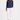 A woman modeling a navy blue long-sleeve golf shirt with a small white 'GOLF' logo on the left chest, paired with white pants and white trainers.