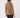 A woman shown from the back wearing a camel brown long-sleeve fleece top and black pants.