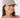 A woman wearing a beige fuzzy knit cap with a small circular logo patch on the front, paired with a tan ribbed turtleneck sweater.