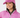 A smiling woman wearing a pink knit cap and a pink zip-front jacket with a white zipper.
