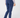 A person shown from the back wearing navy blue slim-fit trousers, a patterned long-sleeve shirt.