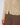 A close-up of a person wearing a long-sleeve button-front blouse with an abstract geometric print in beige, brown, and light blue, paired with solid brown pants.