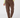 A person wearing brown jogger-style pants with a drawstring waist, side pockets, and zippered details, paired with a light yellow-green top and patterned socks, front view.