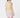 A woman is shown from the back wearing a light beige quilted sleeveless golf puffer vest over a light blue ruffled shirt, paired with a white, purple, and pink patterned mini skirt and a matching patterned headband.