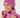 A smiling woman wearing a pink ribbed knit beanie with a small circular star logo and a matching pink puffer jacket.