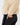 Close-up of a person wearing a beige sherpa fleece jacket and black pants with a side pocket.