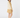 Woman modeling a caramel and parchment ribbed knit top with a caramel golf skort, shown from the back.