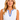 A blonde woman wearing a sleeveless white top with a blue polka dot pattern and a blue scalloped V-neck trim.